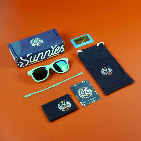 Sky blue polarized baby sunglasses with strap, eco-friendly packaging, UV protection, for newborns 0-24 months.